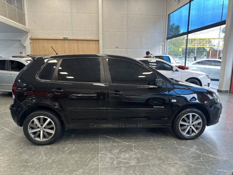 VOLKSWAGEN - POLO - 2008/2009 - Preta - R$ 38.900,00