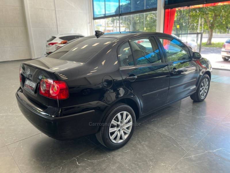 VOLKSWAGEN - POLO SEDAN - 2009/2010 - Preta - R$ 35.900,00