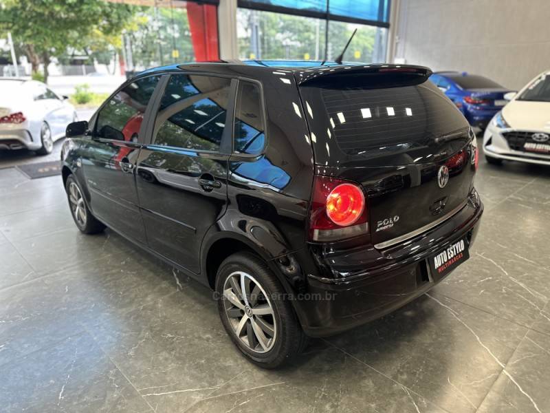 VOLKSWAGEN - POLO - 2008/2009 - Preta - R$ 38.900,00